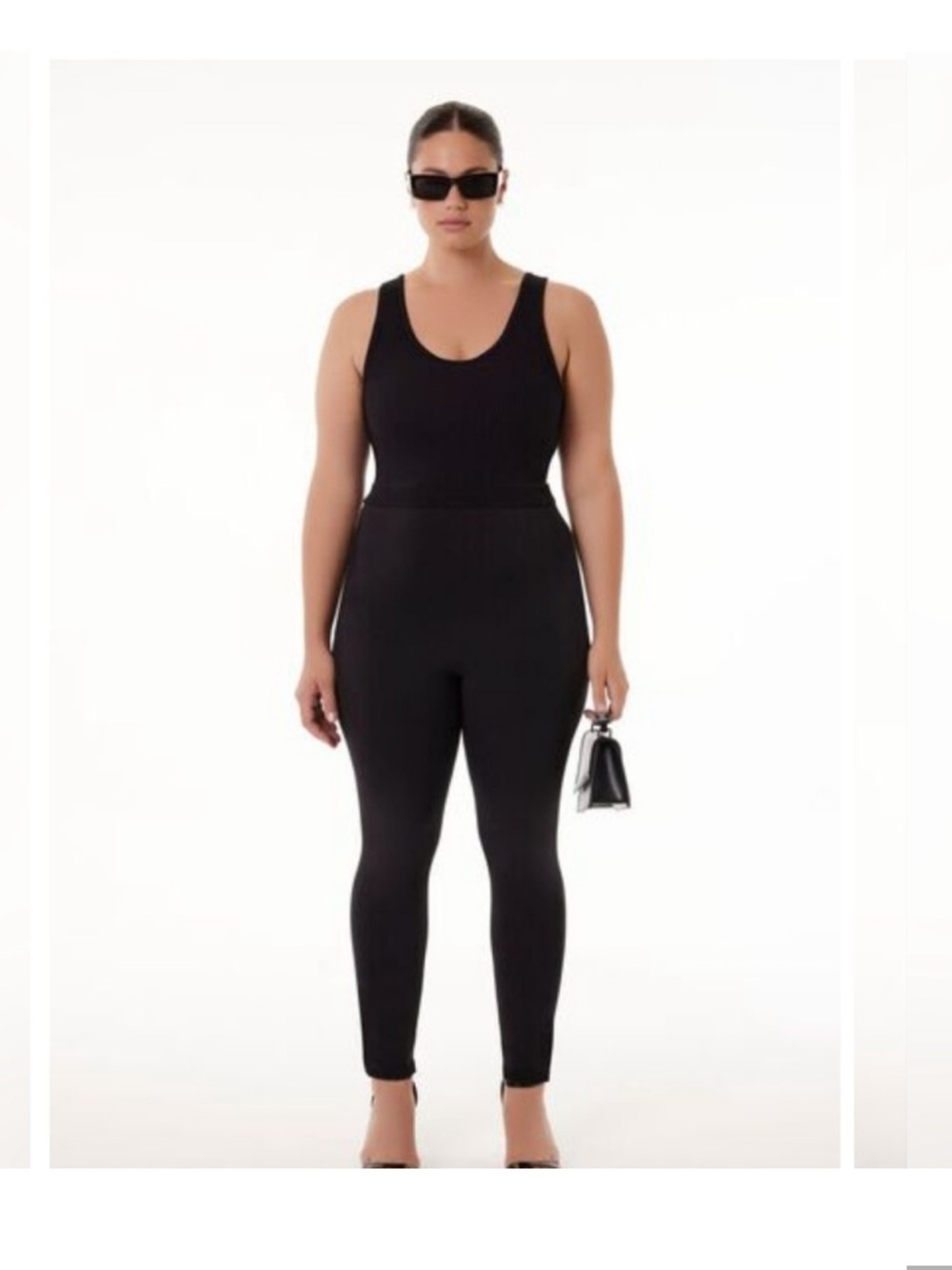 Forever 21/Barney’s NY Black Ribbed Sleeveless Jumpsuit